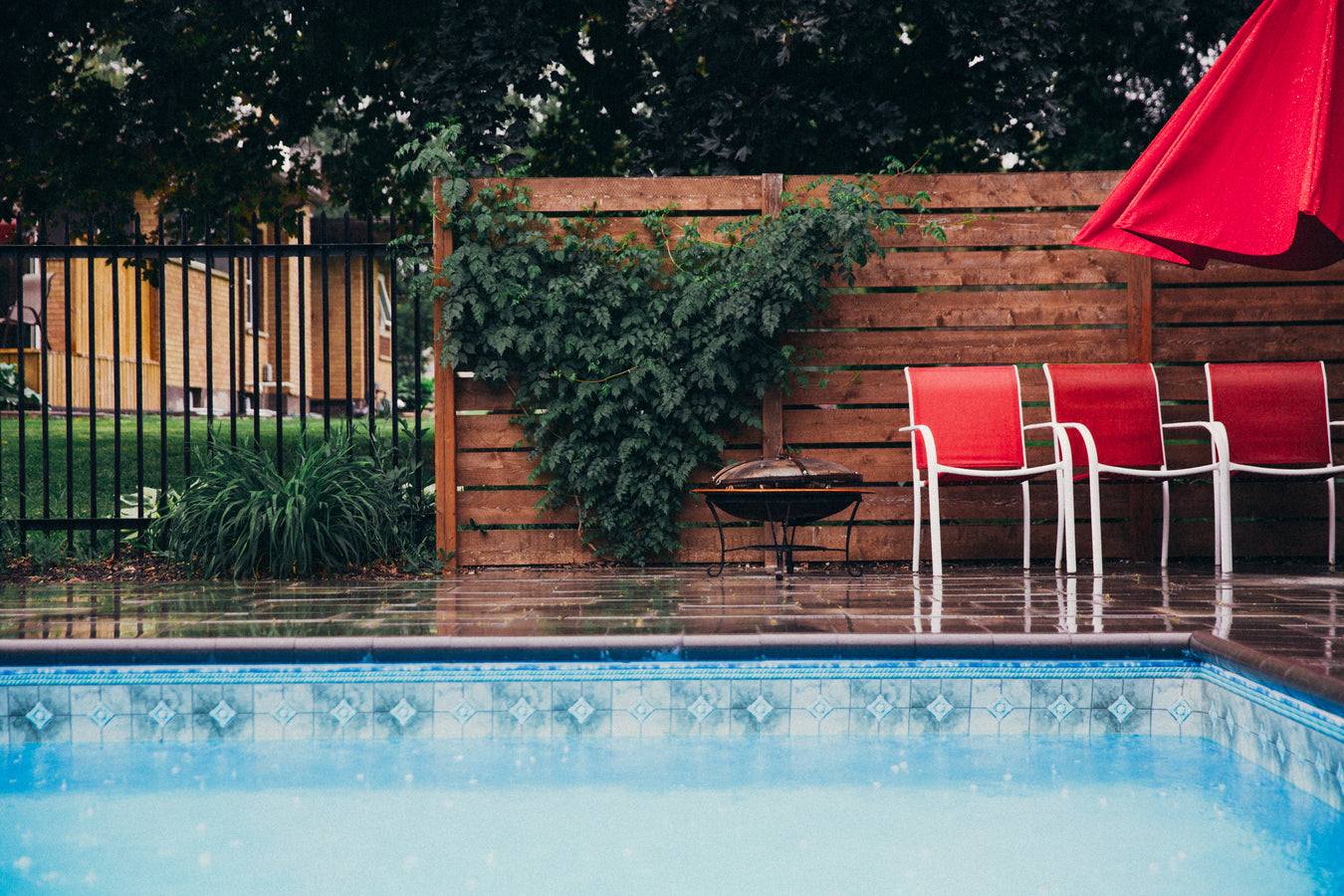 rain-falls-on-clean-pool-and-deck